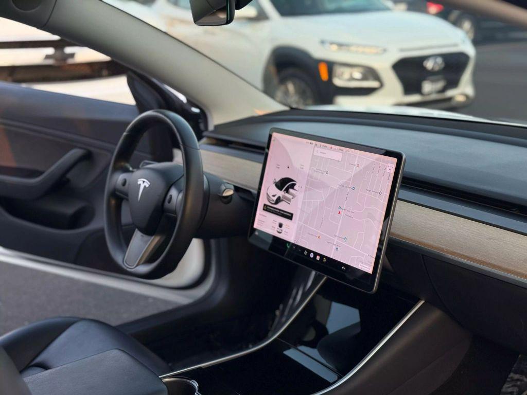 used 2018 Tesla Model 3 car, priced at $18,999