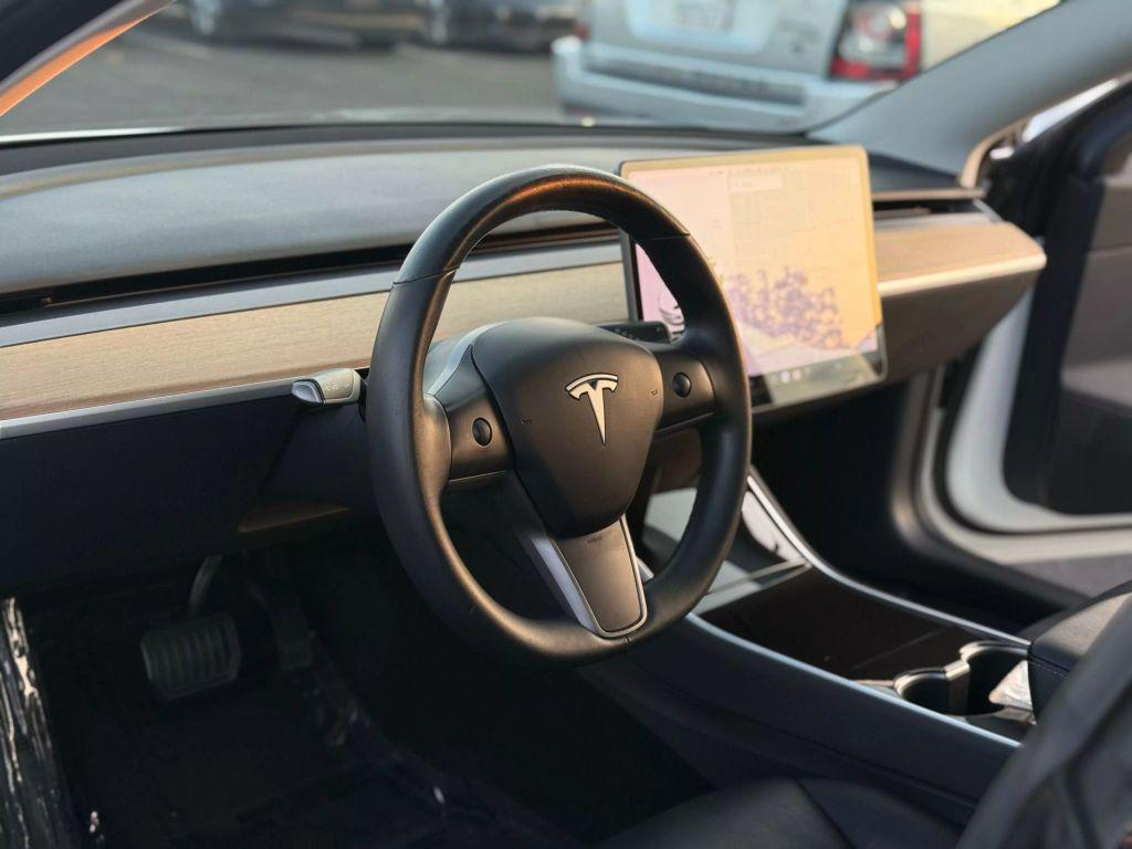used 2018 Tesla Model 3 car, priced at $18,999