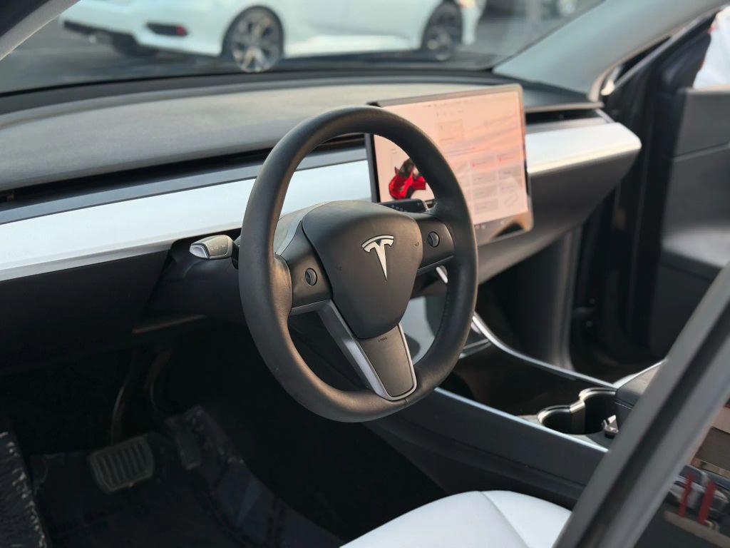 used 2021 Tesla Model Y car, priced at $20,999