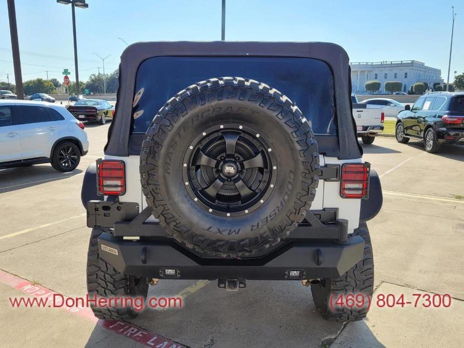 used 2012 Jeep Wrangler Unlimited car, priced at $16,797