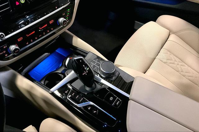 used 2023 BMW 530e car, priced at $42,000