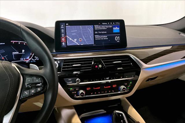 used 2023 BMW 530e car, priced at $42,000