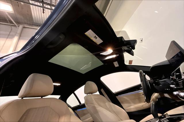 used 2023 BMW 530e car, priced at $42,000