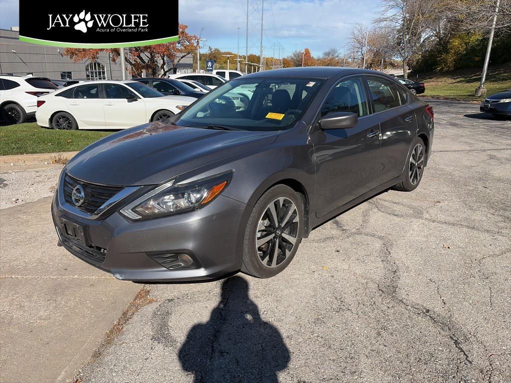 used 2018 Nissan Altima car, priced at $15,000