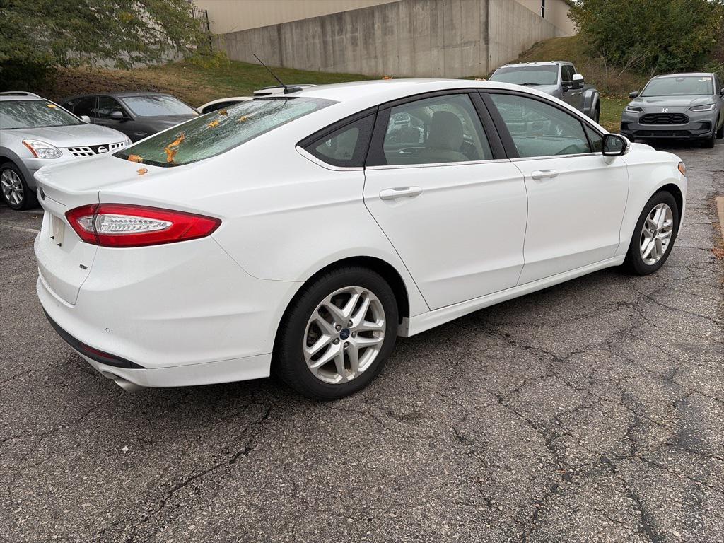 used 2016 Ford Fusion car, priced at $13,400