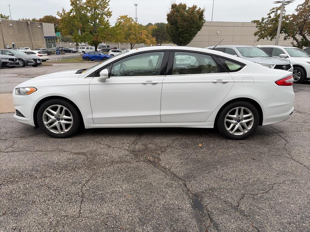 used 2016 Ford Fusion car, priced at $13,400