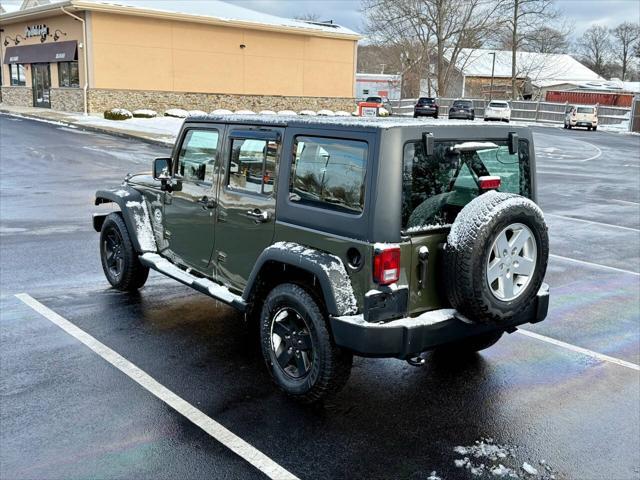 used 2015 Jeep Wrangler Unlimited car, priced at $16,500