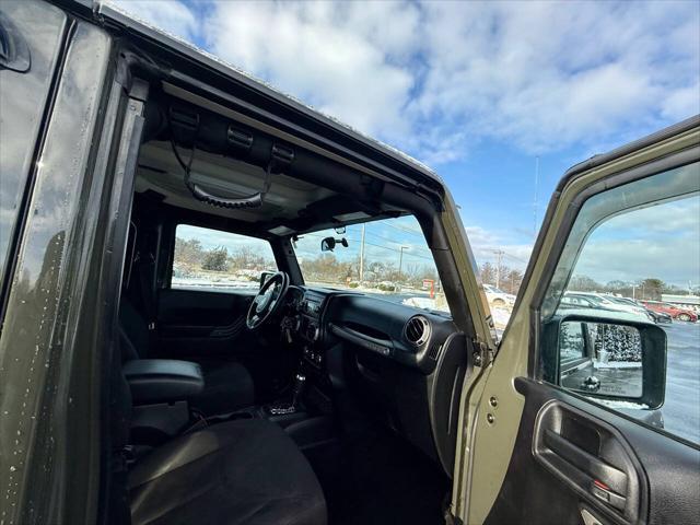 used 2015 Jeep Wrangler Unlimited car, priced at $16,500