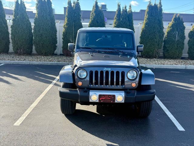 used 2014 Jeep Wrangler Unlimited car, priced at $15,900