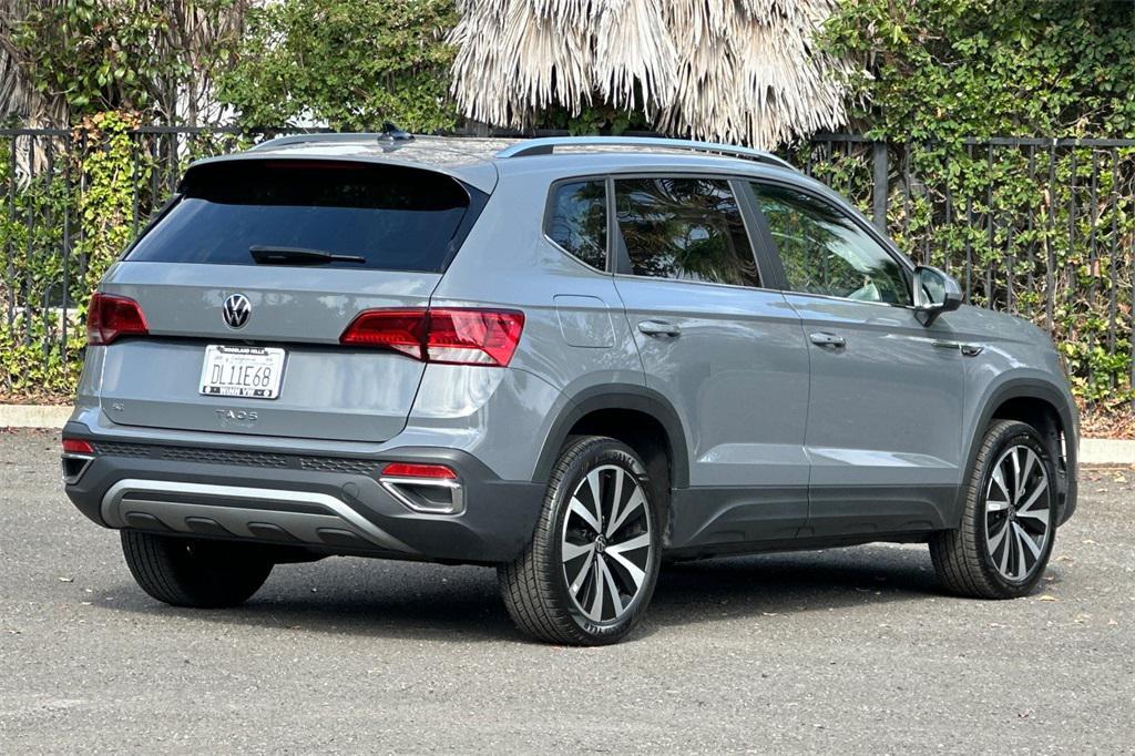 used 2024 Volkswagen Taos car, priced at $23,352
