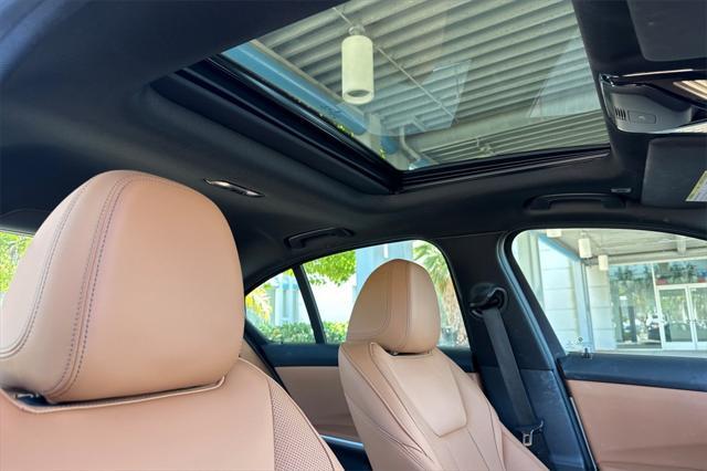 used 2023 BMW 330 car, priced at $37,103