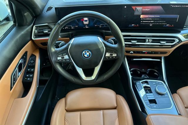 used 2023 BMW 330e car, priced at $33,574