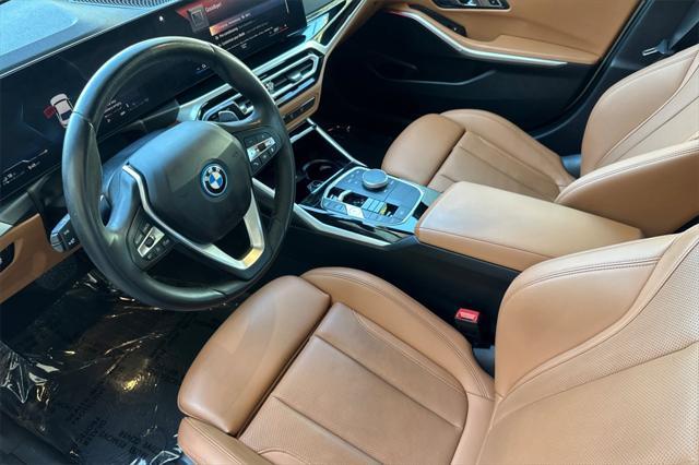 used 2023 BMW 330e car, priced at $33,574
