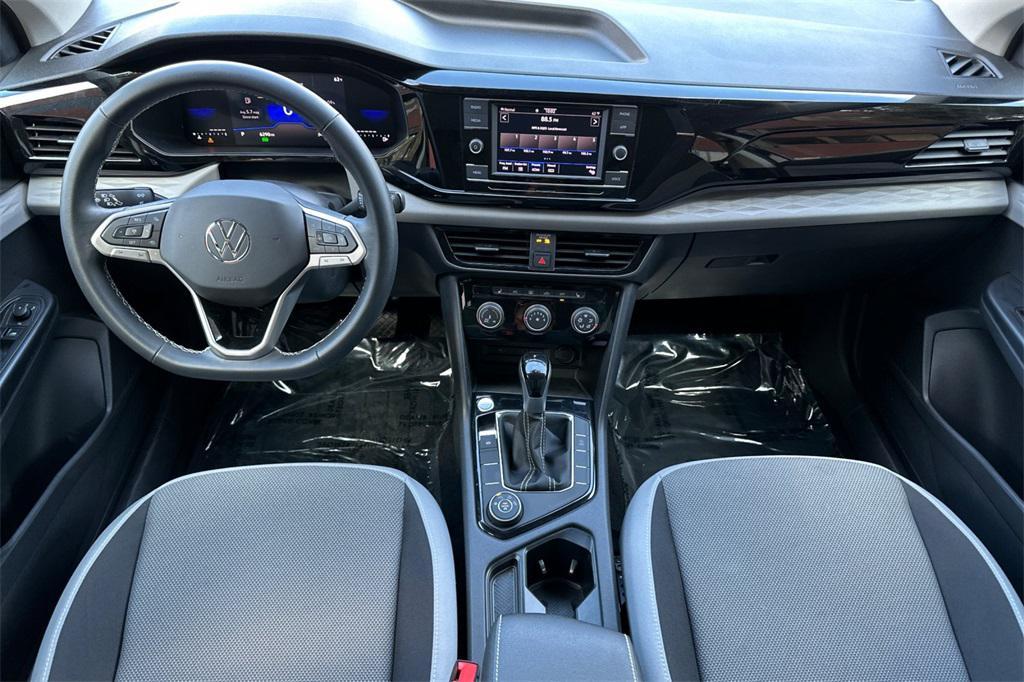 used 2024 Volkswagen Taos car, priced at $22,398