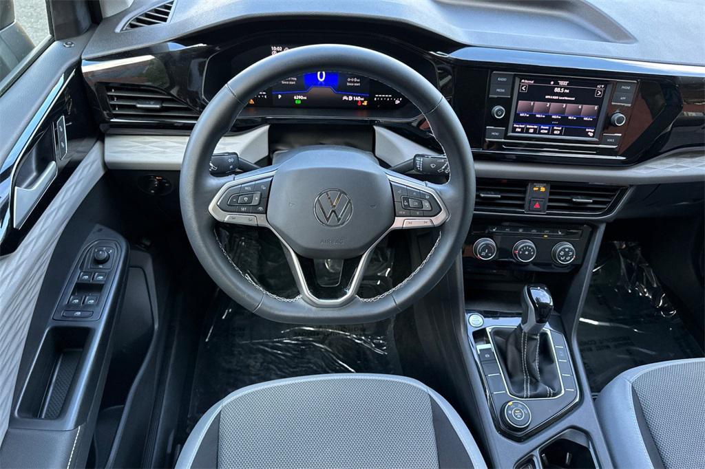 used 2024 Volkswagen Taos car, priced at $22,398