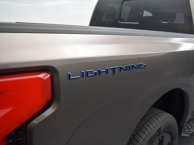 new 2023 Ford F-150 Lightning car, priced at $67,405