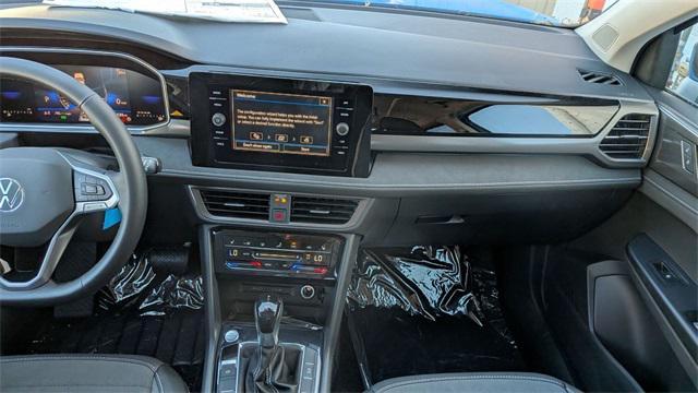 new 2025 Volkswagen Taos car, priced at $27,106