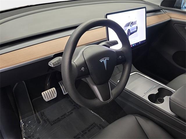 used 2024 Tesla Model Y car, priced at $38,990