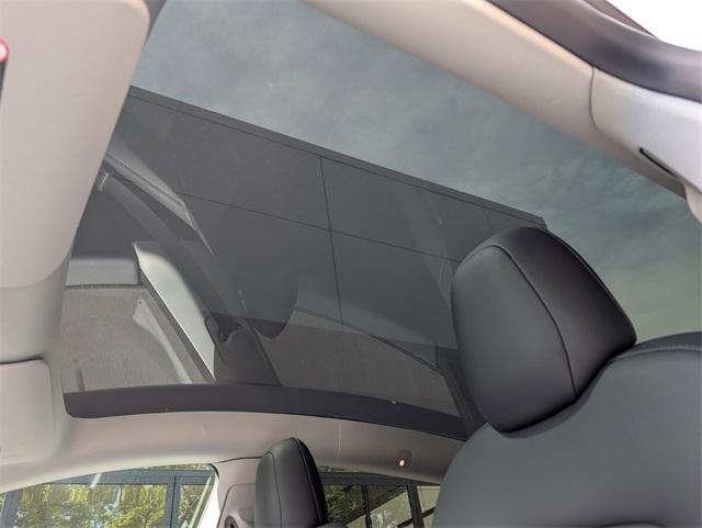 used 2022 Tesla Model Y car, priced at $27,990