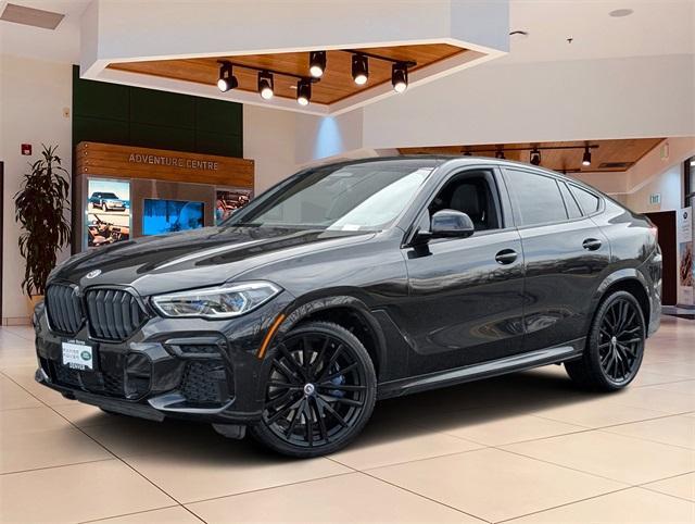 used 2023 BMW X6 car, priced at $67,880