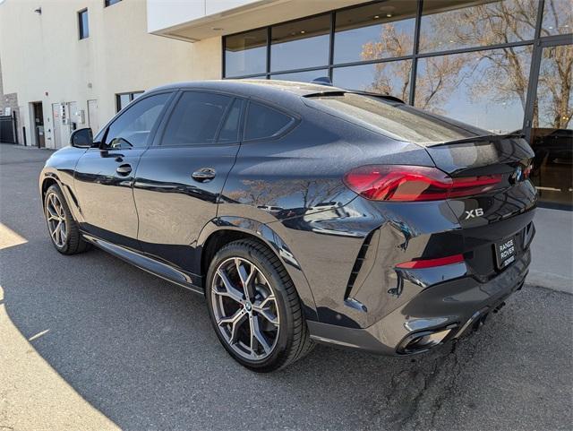 used 2023 BMW X6 car, priced at $58,940