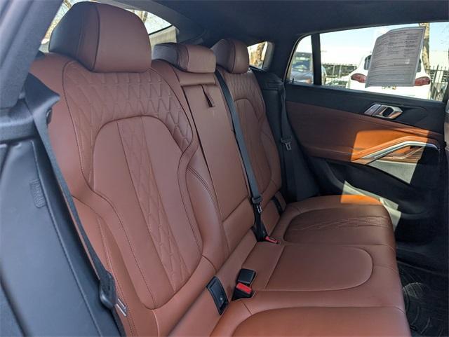 used 2023 BMW X6 car, priced at $58,940