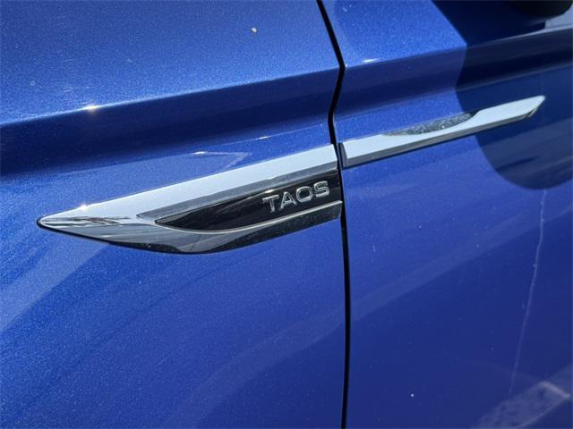 used 2023 Volkswagen Taos car, priced at $20,999