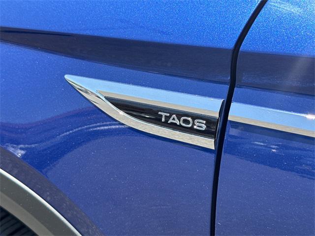 used 2023 Volkswagen Taos car, priced at $20,699