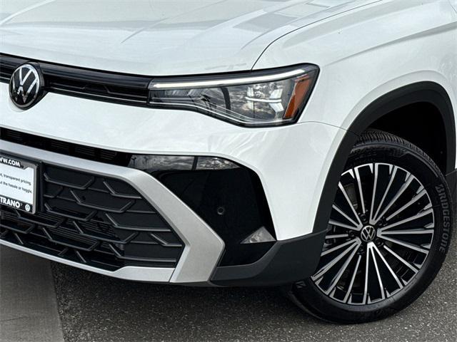 used 2025 Volkswagen Taos car, priced at $26,616