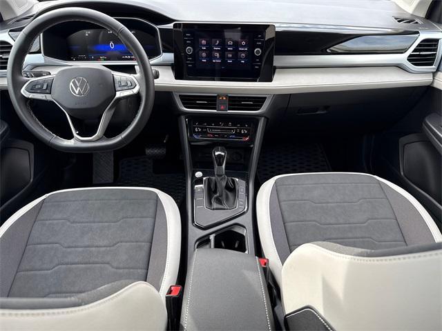 used 2025 Volkswagen Taos car, priced at $26,616