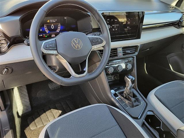 new 2025 Volkswagen Taos car, priced at $25,716