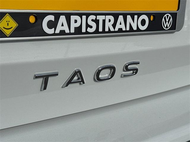 new 2025 Volkswagen Taos car, priced at $25,521