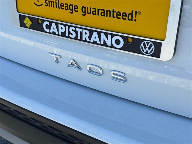 new 2025 Volkswagen Taos car, priced at $25,011