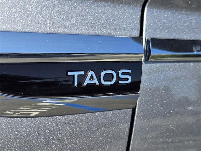 new 2024 Volkswagen Taos car, priced at $23,896