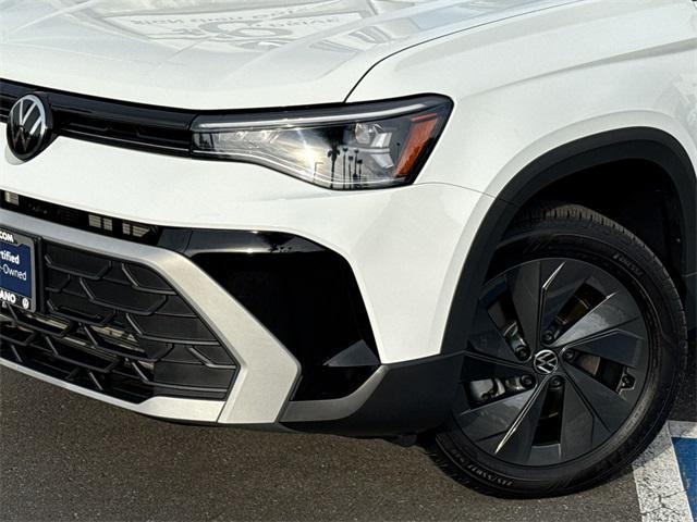 used 2025 Volkswagen Taos car, priced at $22,999