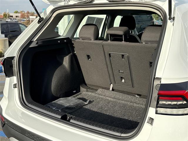 used 2025 Volkswagen Taos car, priced at $22,999