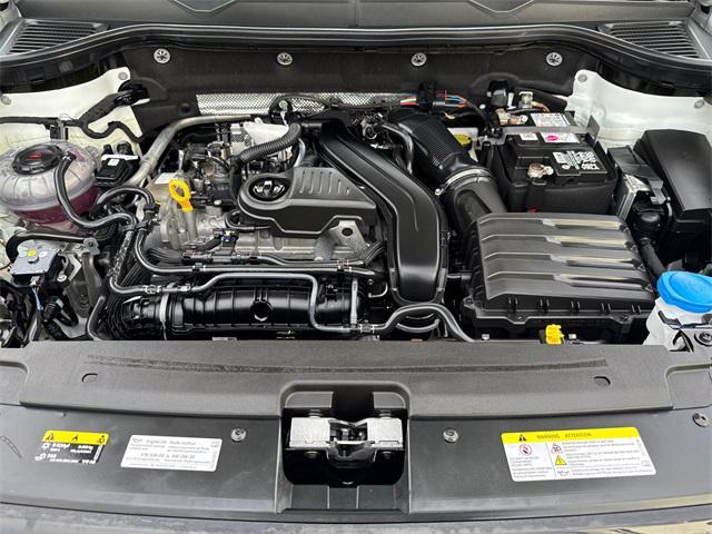 used 2025 Volkswagen Taos car, priced at $22,999