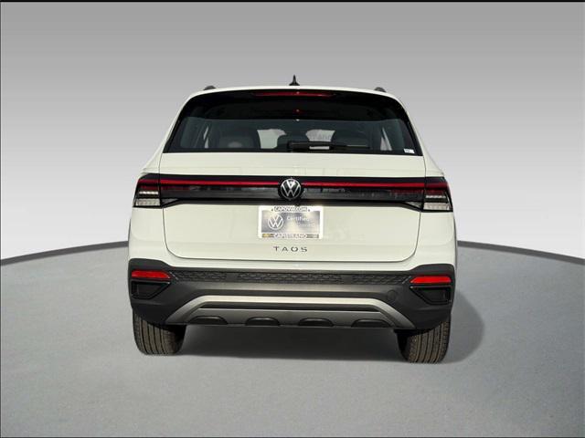 used 2025 Volkswagen Taos car, priced at $22,999