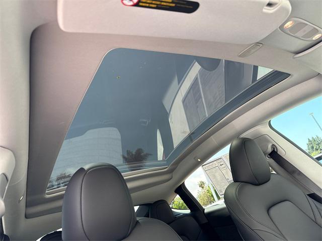 used 2023 Tesla Model Y car, priced at $34,899