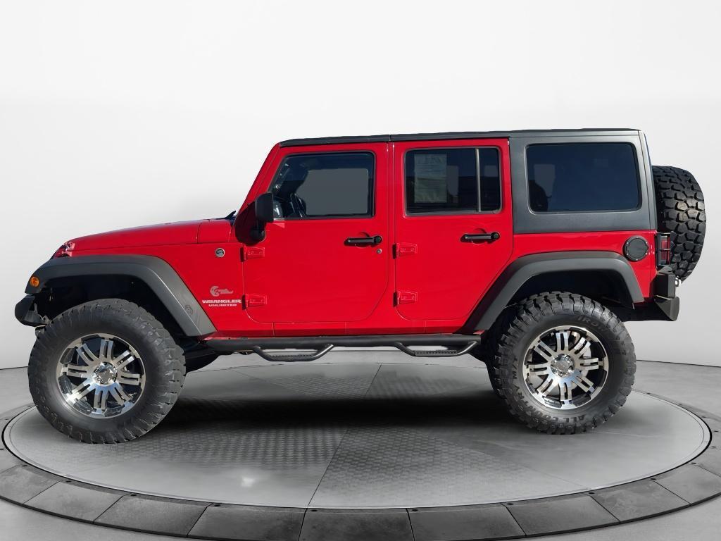 used 2011 Jeep Wrangler Unlimited car, priced at $18,594
