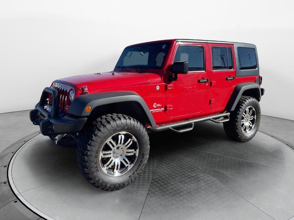 used 2011 Jeep Wrangler Unlimited car, priced at $18,594