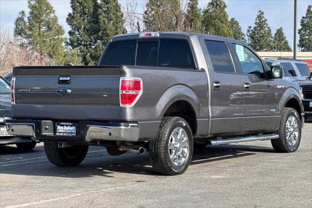 used 2014 Ford F-150 car, priced at $15,000