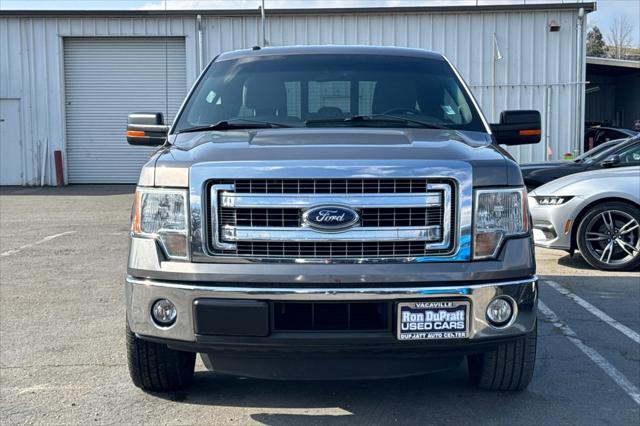 used 2014 Ford F-150 car, priced at $15,000