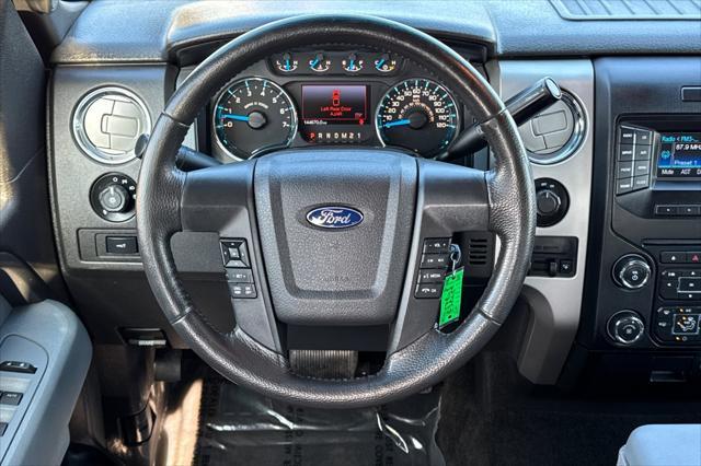 used 2014 Ford F-150 car, priced at $15,000