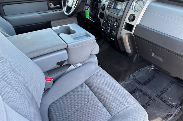 used 2014 Ford F-150 car, priced at $15,000