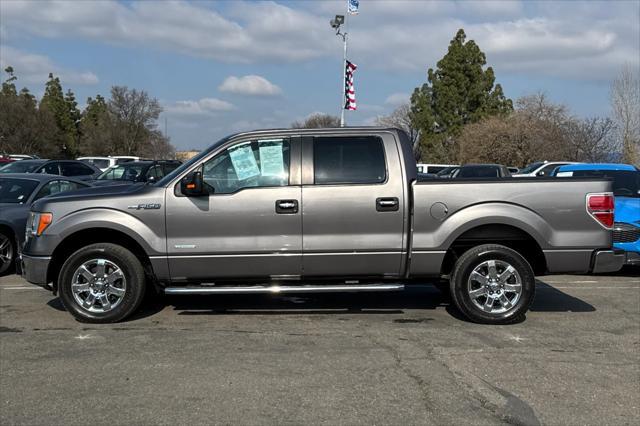 used 2014 Ford F-150 car, priced at $15,000