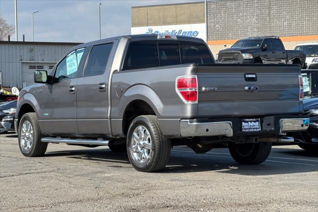 used 2014 Ford F-150 car, priced at $15,000