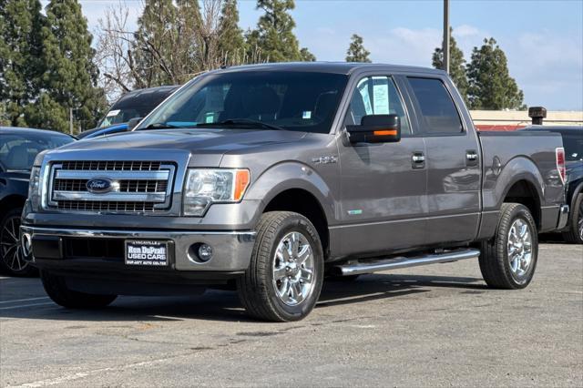 used 2014 Ford F-150 car, priced at $15,000