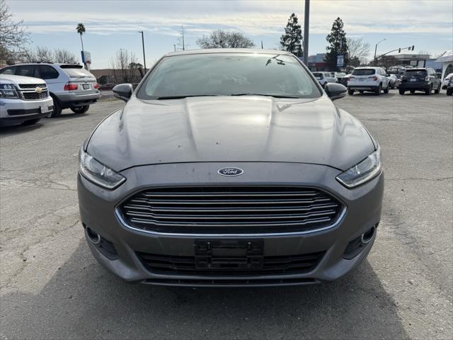 used 2014 Ford Fusion car, priced at $7,500