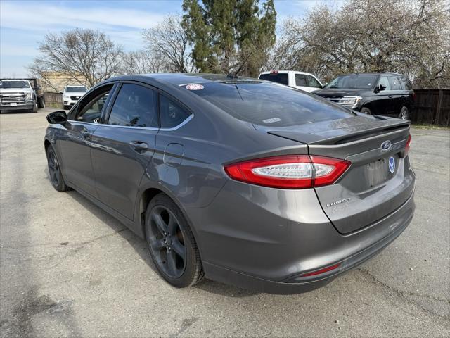 used 2014 Ford Fusion car, priced at $7,500